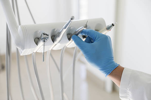 Professional Root Canal Treatment technician working in Little Cypress, TX